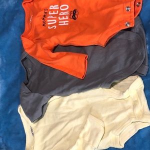 Three newborn onesies